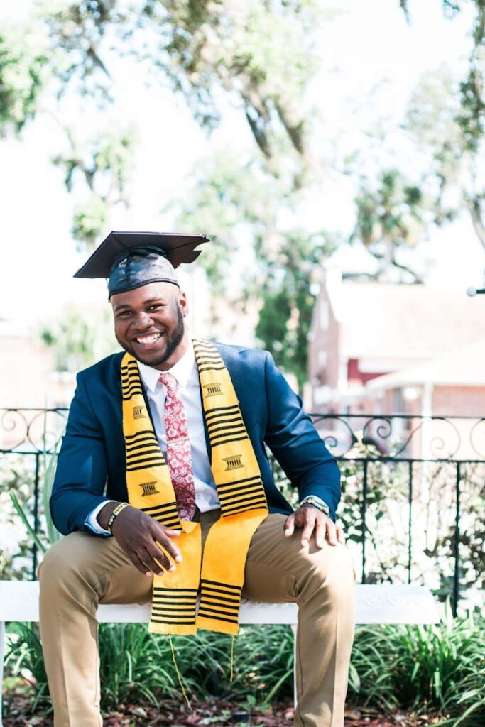 Photo of Man Wearing Graduation Cap